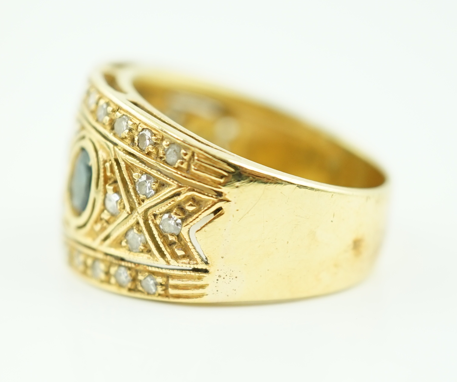 An Italian Byzantine style 18k gold, sapphire and diamond cluster ring